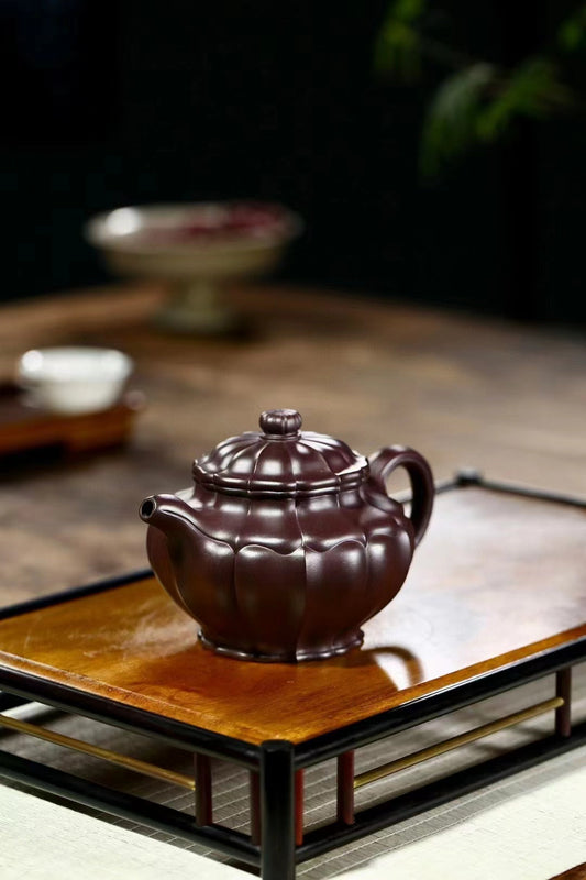 紫砂壶“吐黑”怎么办？是泥料问题还是养护不当？