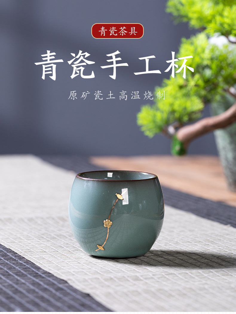 Longquan celadon iron body plum blossom handmade master cup ceramic tea single cup, kung fu tea set teacup