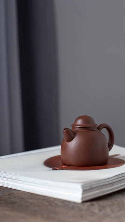 Little fisherman's purple clay teapot