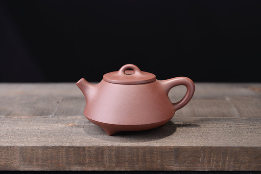Purple clay three-legged stone scoop purple clay teapot