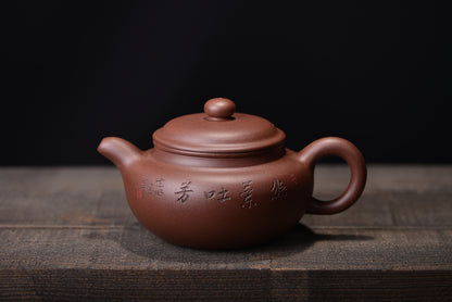 Antique purple clay teapot