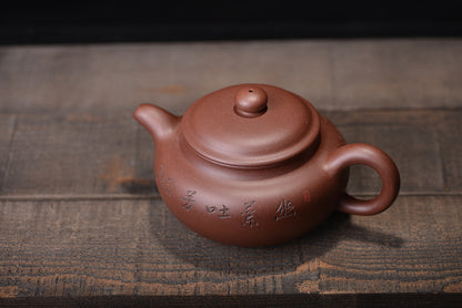 Antique purple clay teapot